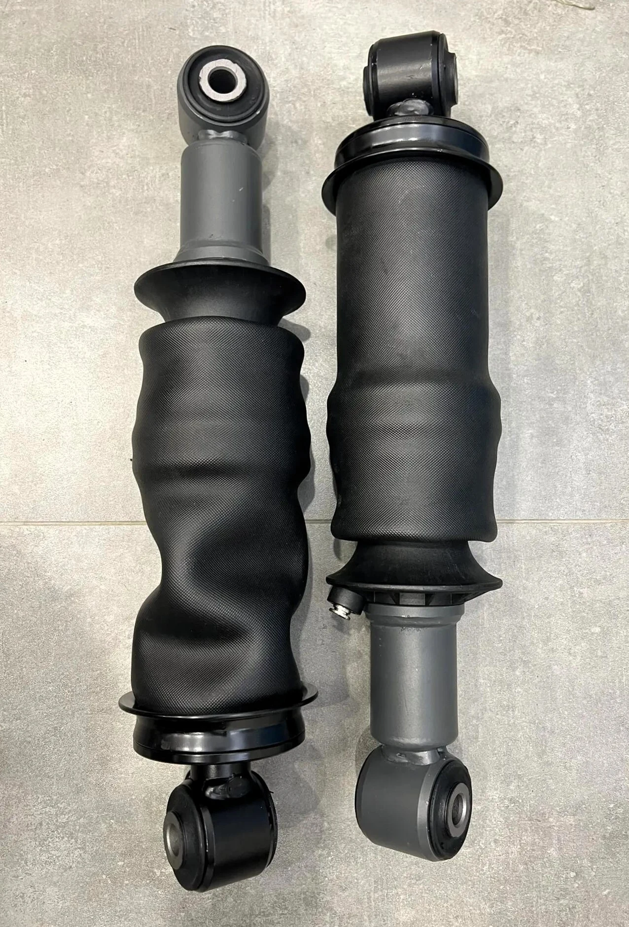 Амортизатор кабины передний (пневмо) Howo T5G 712W41722-6022