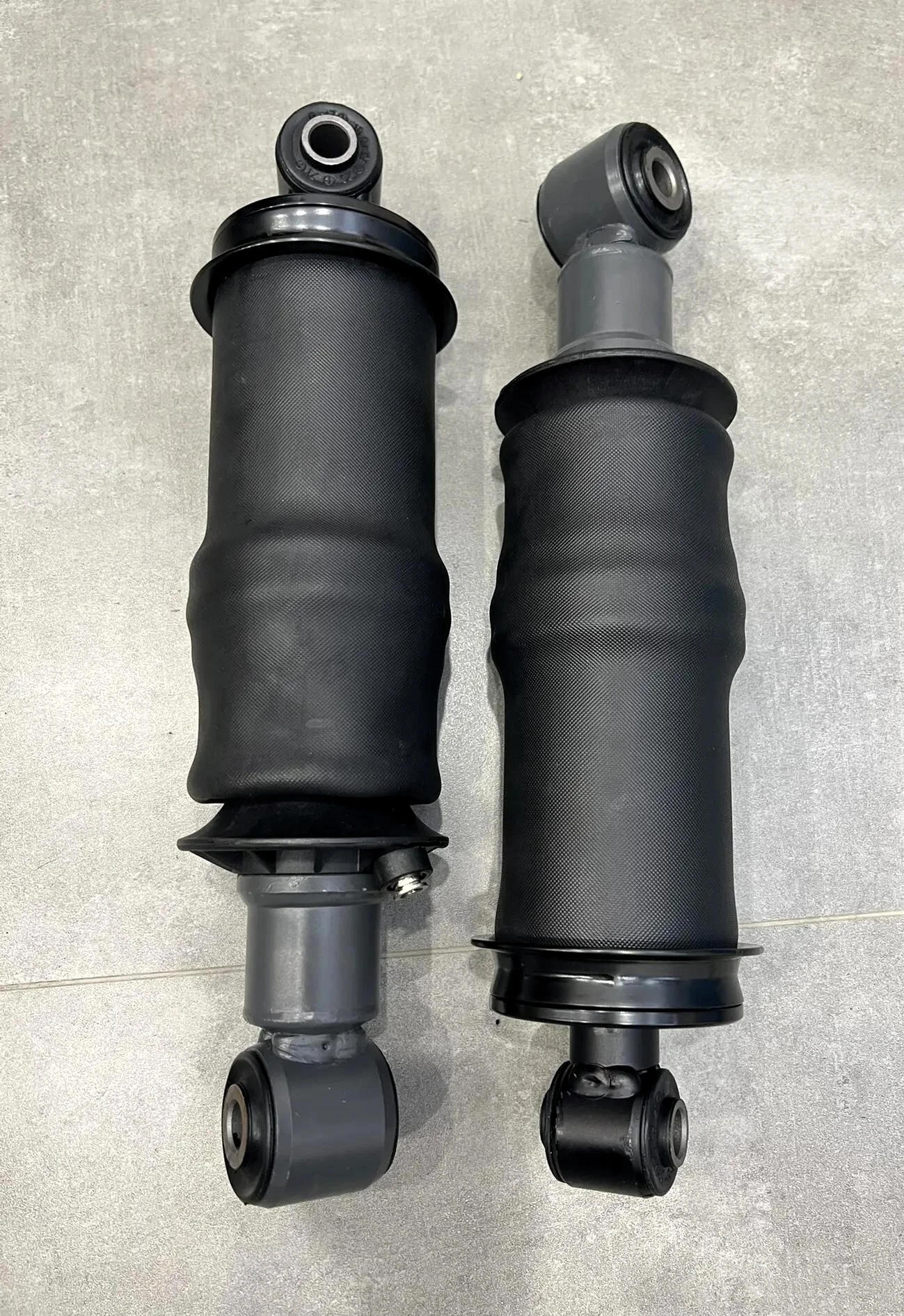 Амортизатор кабины задний (пневмо) Howo T5G 712W41722-6032